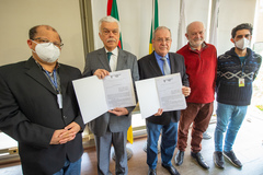 Assinatura de convênio com o Presidente do Instituto Histórico e Geográfico do RGS, Miguel Frederico do Espírito Santo