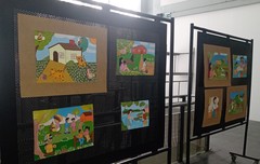 Pinturas com traço da arte naif estão na entrada do Plenário Otávio Rocha (Foto: divulgação / CMPA)