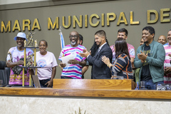 Período de comunicações em homenagem a Sociedade Beneficente Recreativa Cultural Associação Comunitária Copacabana, campeã do grupo Prata do carnaval de Porto Alegre