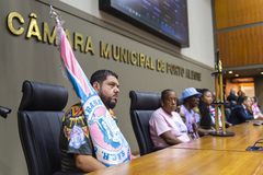 Período de comunicações em homenagem a Sociedade Beneficente Recreativa Cultural Associação Comunitária Copacabana, campeã do grupo Prata do carnaval de Porto Alegre
